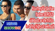 KOURTNEY KARDASHIAN flashes SERIOUS sideboob as she frolics in daring swimsuit | NEWS SHOWBIZ