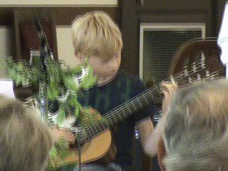 M2U02408 eleve guitare jour Anatole de Thierry Tisserand