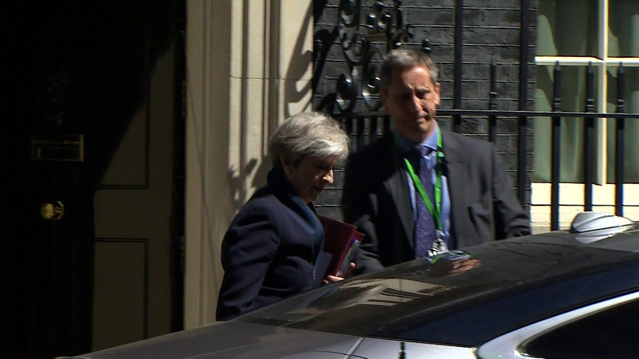 Prime Minister Theresa May leaves Downing Street for PMQ's