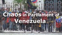 Pro-government supporters' attack on parliament raises tension in Venezuela