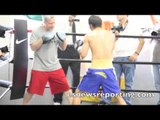 olympic gold winner Zou Shiming working mitts with Freddie Roach