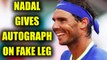Wimbledon 2017 : Rafael Nadal gives autograph on prosthetic leg of a fan | Oneindia News