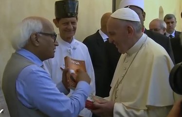 Mr. Sudheendra Kulkarni presents Dr Muhammad Tahir-ul-Qadri’s book “FATWA ON TERRORISM AND SUICIDE BOMBING” to Pope Fran
