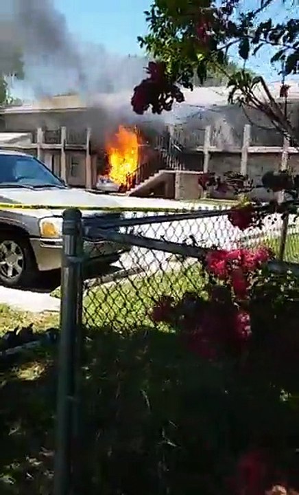 Car Still on Fire With Man Inside