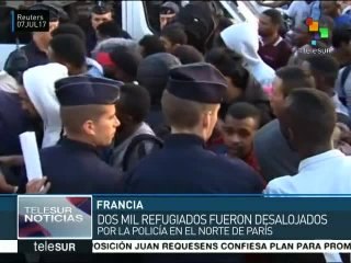 Policía francesa desaloja campamento con 2 mil refugiados en París