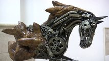 Artist creates sculptures from old car parts