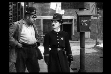 Charlie Chaplin - 1917-01-22 - Тихая улица (Easy Street)