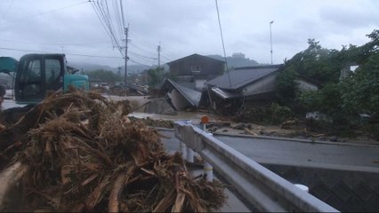 Japan continues to search for storm survivors