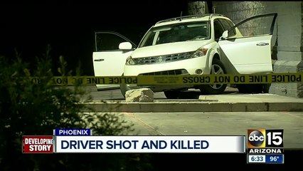 Three detained after body found in SUV in west Phoenix
