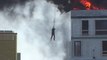 Man Escapes Burning Building by Holding on to Crane Hook