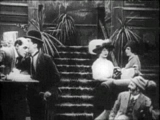 Charlie Chaplin - 1914-05-04 - Застигнутый дождём (Caught in the Rain)