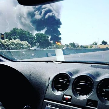 Large Warehouse Fire Seen From Highway in French Camp
