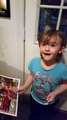 Little girl excited for letter from Santa Claus