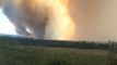 Giant Smoke Clouds Churned Up by Wildfires Blot Out Sky