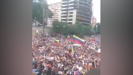 Thousands march in Caracas to mark '100 days of resistance'