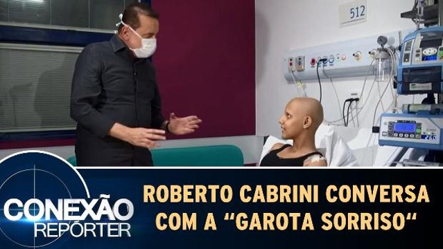 Roberto Cabrini conversa com a Garota Sorriso do GRAAC
