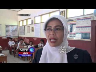 Скачать видео: Diguyur Hujan Deras, Ruang Kelas SD di Garut Ambruk dan Rusak Parah - NET12