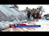 Petugas Gabungan Bangun Tanggul Darurat untuk Tanggulangi Banjir Rob Pantai Mutiara - NET12
