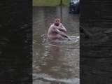Man Takes a Bath in the Flooded Streets of Saskatoon