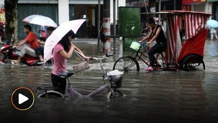 Heavy rain in Southern China causes floods, killing 56