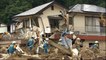Japan floods: PM Shinzo Abe visits worst affected areas