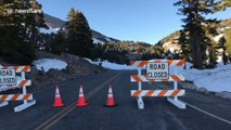 Californian mountain road covered in snow despite heat wave