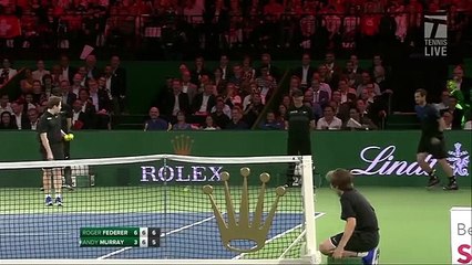 Match for Africa- A ball kid plays with Roger Federer on match point