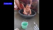 Funny baby swimming,splashing ,playing in tub