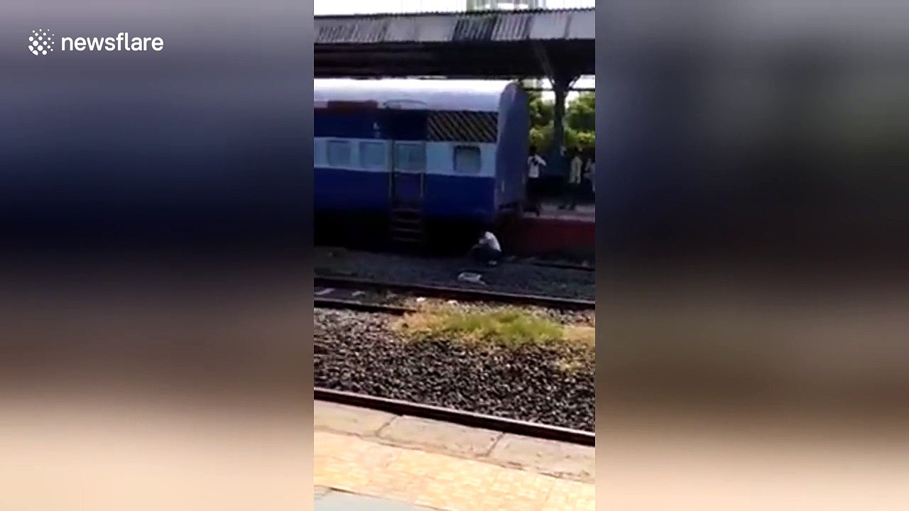 Onlookers use stones to stop train which starts rolling on its own