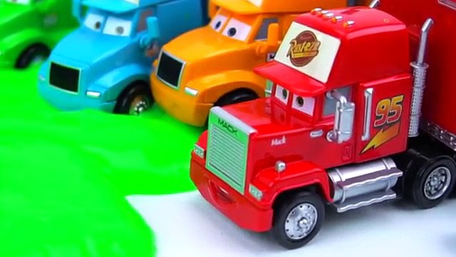 DISNEY PIXAR CARS MATER PULLS SLIME PRANK ON LIGHTNING AT PISTON CUP MACK HAULERS GET HIM!