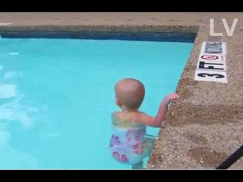 Baby Swims across pool