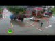 Chinese crazy traffic video: Truck misses pedestrian, smashes another truck, flees