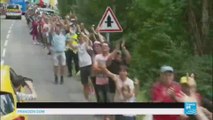 Tour de France caravan showers fans with gifts