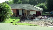 A sinkhole swallows 2 houses in Florida
