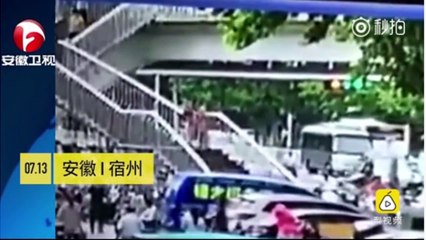 Woman glued to her phone falls down stairs in China