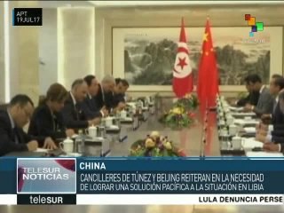 Cancilleres de China y Túnez abogan por solución pacífica en Libia