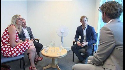 Prince Harry jokingly flashes his get out of jail free card