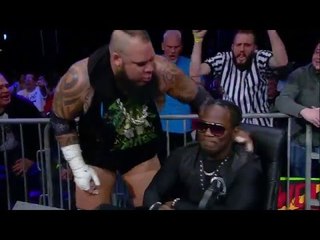 Tyrus attacks Pope at Ringside
