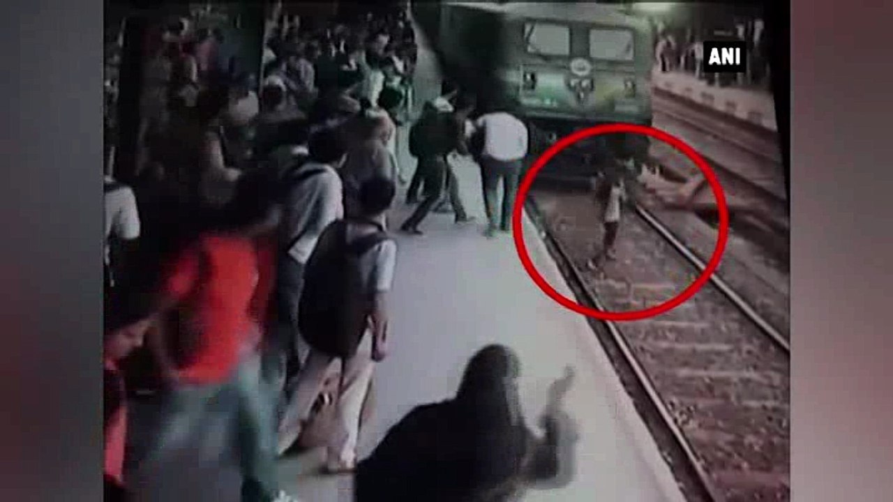 Girl escapes Death Miraculously after being Run Over by Train
