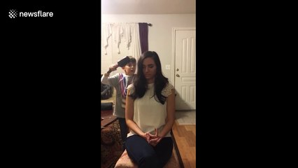 Boy actually cuts mother's hair while filming ASMR video