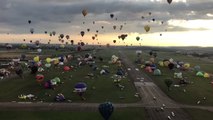 Hot Air Balloons Fill Morning Sky Above Chambley-Bussières Air Base