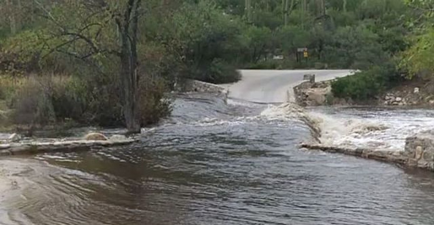 Severe Flooding In Canyon Submerges Bridge