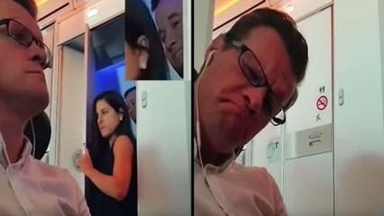 Two passengers Are Leaving The Toilet On A Virgin Atlantic Flight