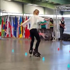 Small girl perfoming roller skating