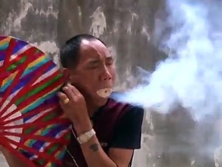 Man can set sawdust on fire using his mouth! ...(480p)