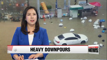 Tải video: Downpours across capital area caused flooding on Sunday