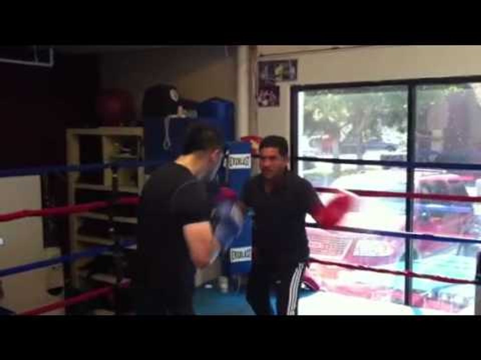 Rios working the mitts