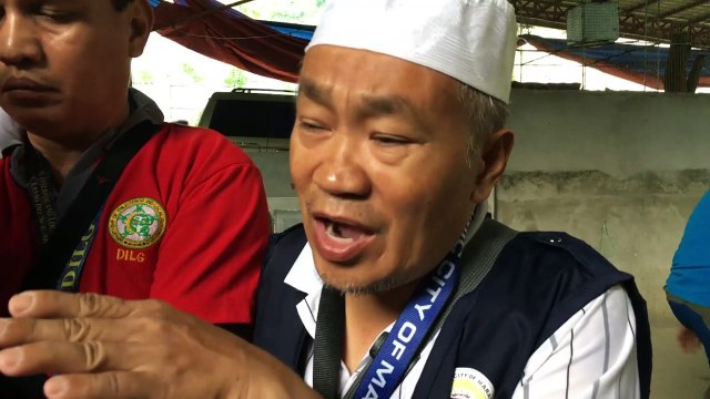 Victims buried as fighting rages on in southern Philippines