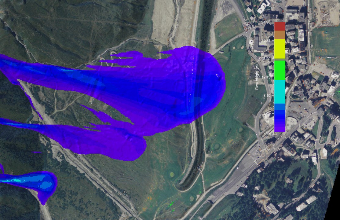 Modelling: a giant dense snow avalanche hits a dam and stops after a partial overunning.