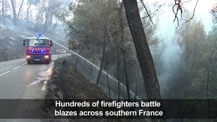 Hundreds battle wild fires across southern France